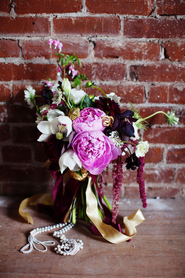 orchid and peony bouquet with brooches by Anastasia Ehlers | photo by Anne Nunn