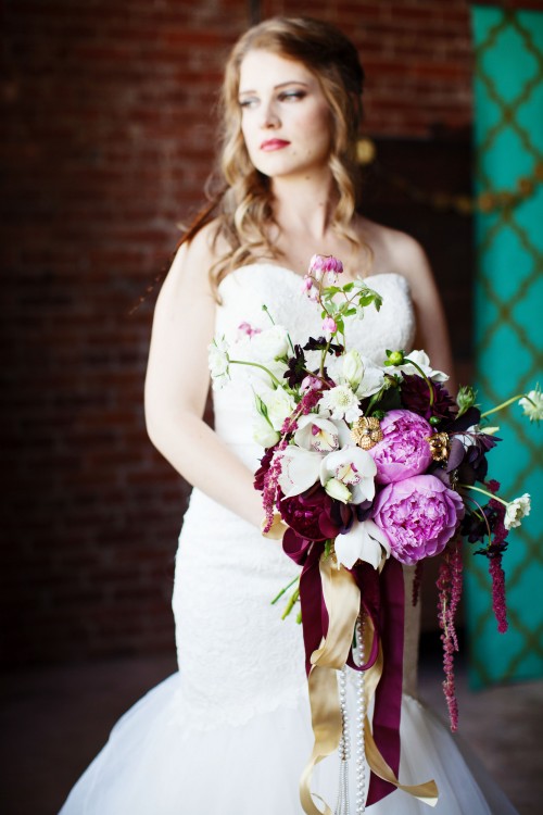 peony, orchid, and amaranthus bouquet with brooches by Anastasia Ehlers, photo by Anne Nunn