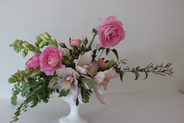 pink orchid and ranunculus arrangement by anastasia ehlers