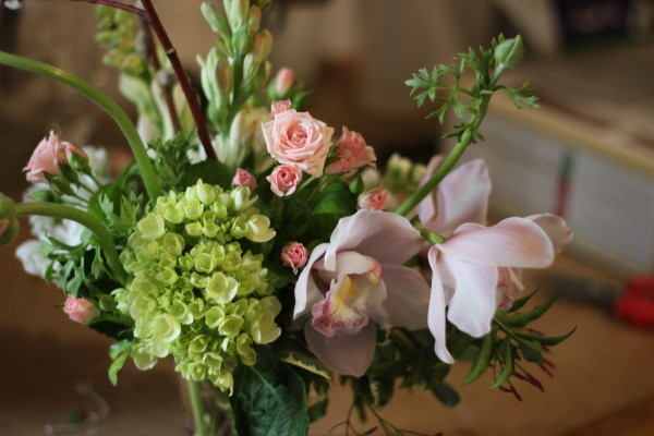 hydrangea and orchid arrangement by anastasia ehlers