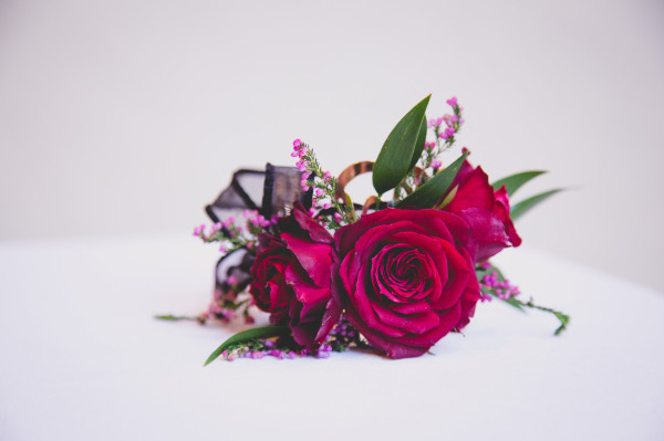 red rose corsage by Anastasia Ehlers | photo by Cat Dossett