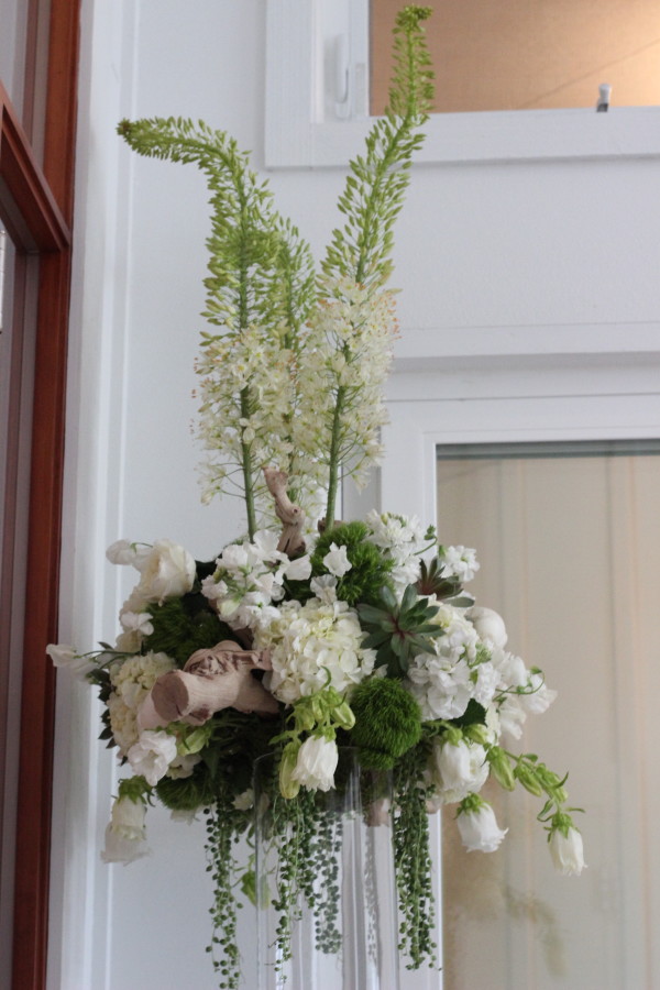 elevated arrangement with peonies, hydrangea, and grape wood by anastasia floral design