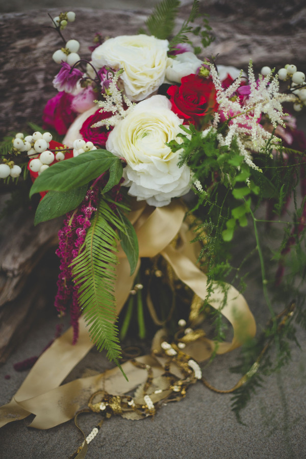 gold-trimmed woodsy bouquet with Japanese ranunculus, astilbe, snowberries, and ferns by Anastasia Floral | photo by Cat Dossett